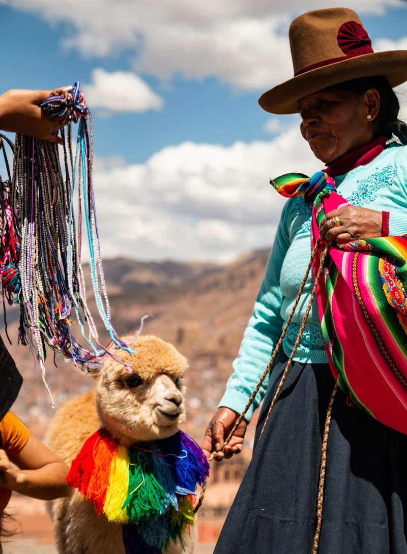 woman standing near mascot
